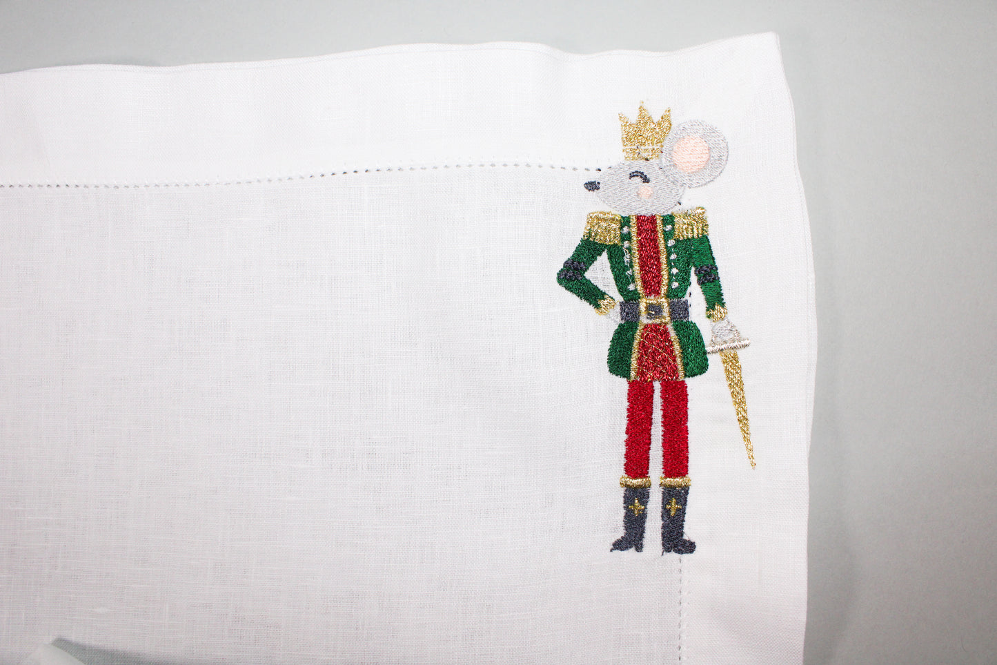 JGO DE 4 INDIVIDUALES Y 4 SERVILLETAS RATON CASCANUECES .