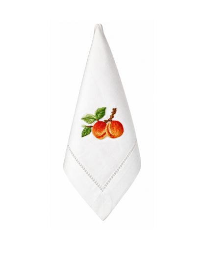 Servilleta de lino con bordado de durazno.