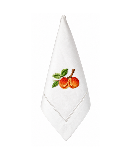 Servilleta de lino con bordado de durazno.