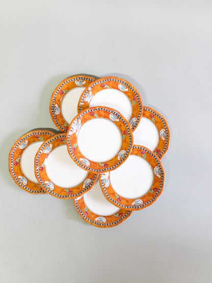 Juego de 8 platos naranjas pájaros