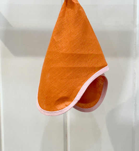 Servilleta de lino naranja con ribete rosa
